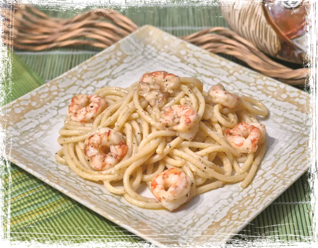 Spaghettoni cacio e pepe con gamberi Spaghettoni cacio e pepe con gamberi