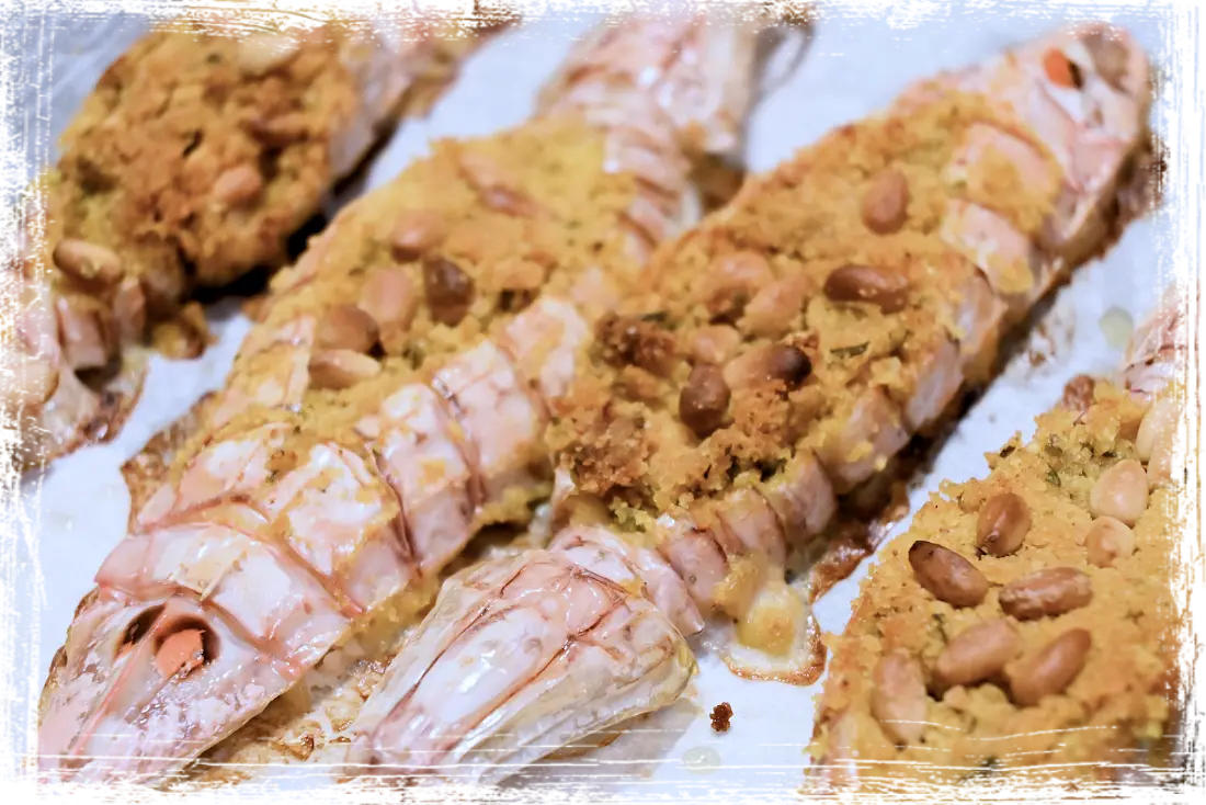 Canocchie al forno con pinoli Canocchie al forno con pinoli