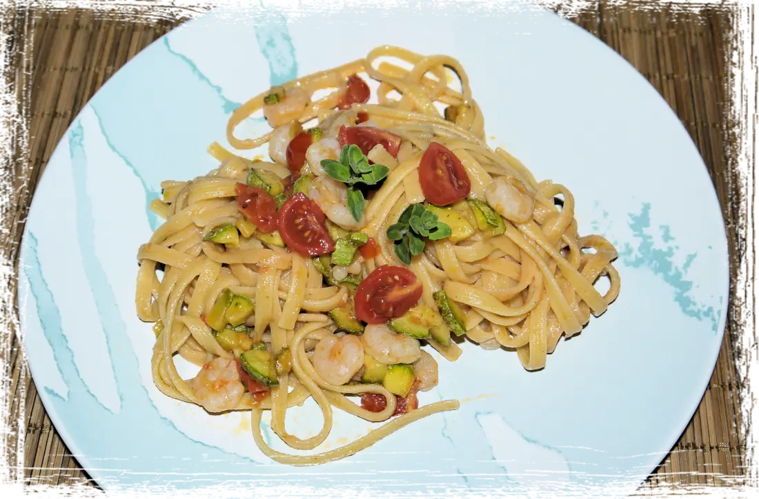Tagliolini all'arancia gamberi e zucchine Tagliolini all'arancia gamberi e zucchine