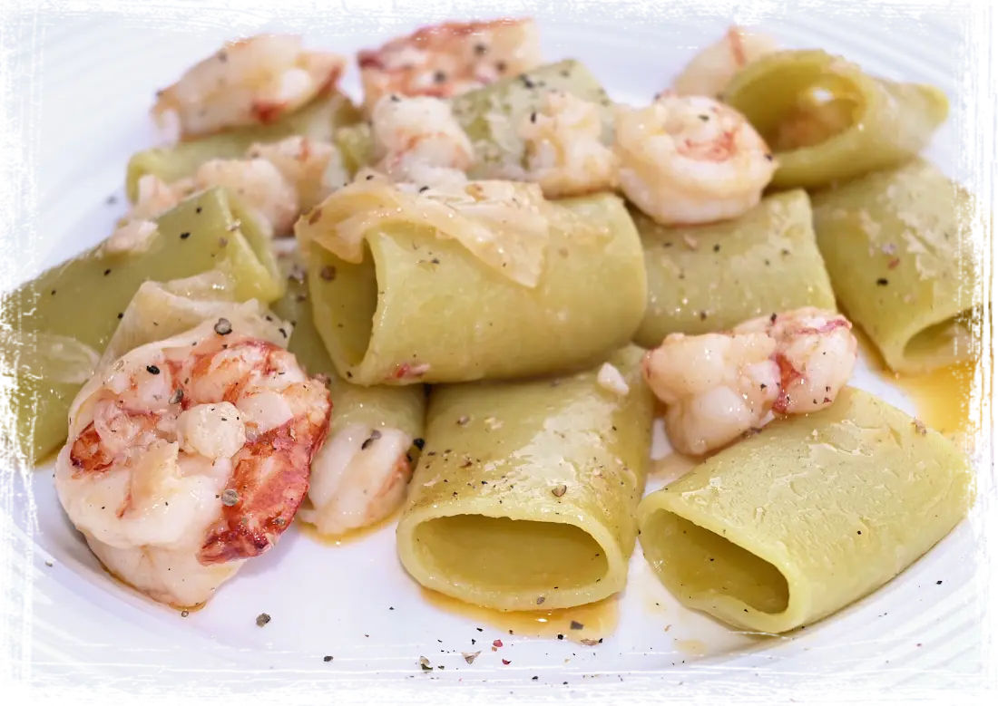 Paccheri al bergamotto con gamberi e zenzero in agrodolce Paccheri al bergamotto con gamberi e zenzero in agrodolce