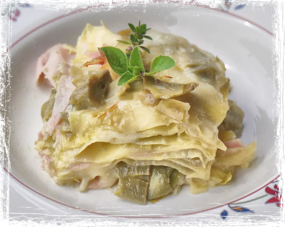 Lasagne con carciofi e prosciutto cotto Lasagne con carciofi e prosciutto cotto