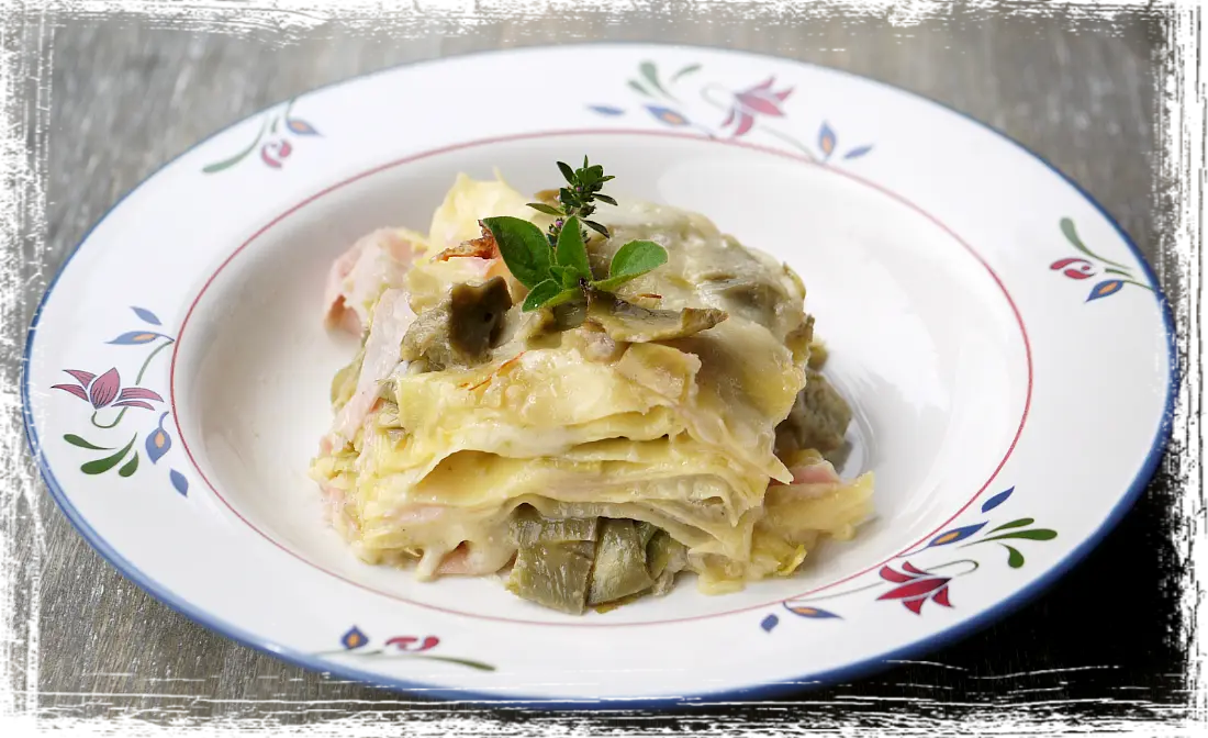 Lasagne con carciofi e prosciutto cotto Lasagne con carciofi e prosciutto cotto