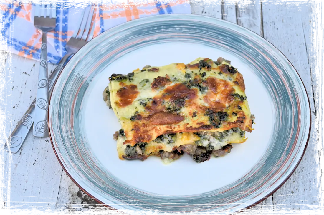 Lasagne con salsiccia, cavolo nero, zucca e provola