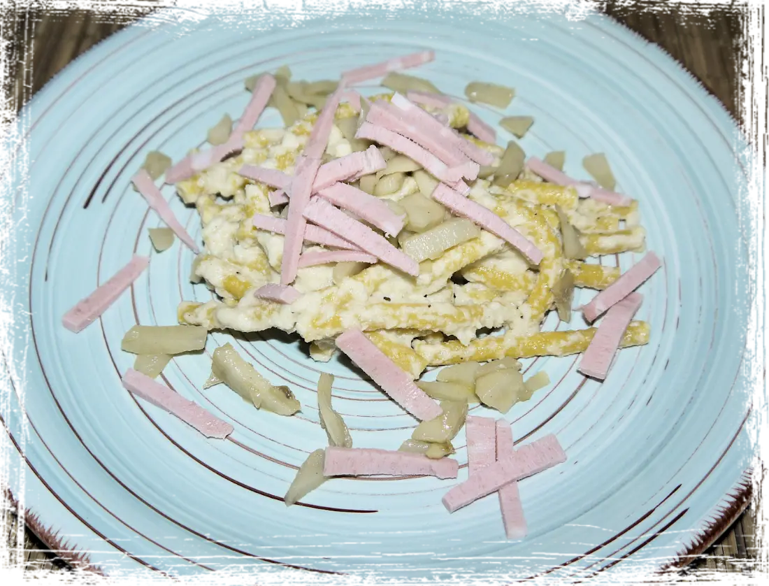 Passatelli con topinambour e mortadella