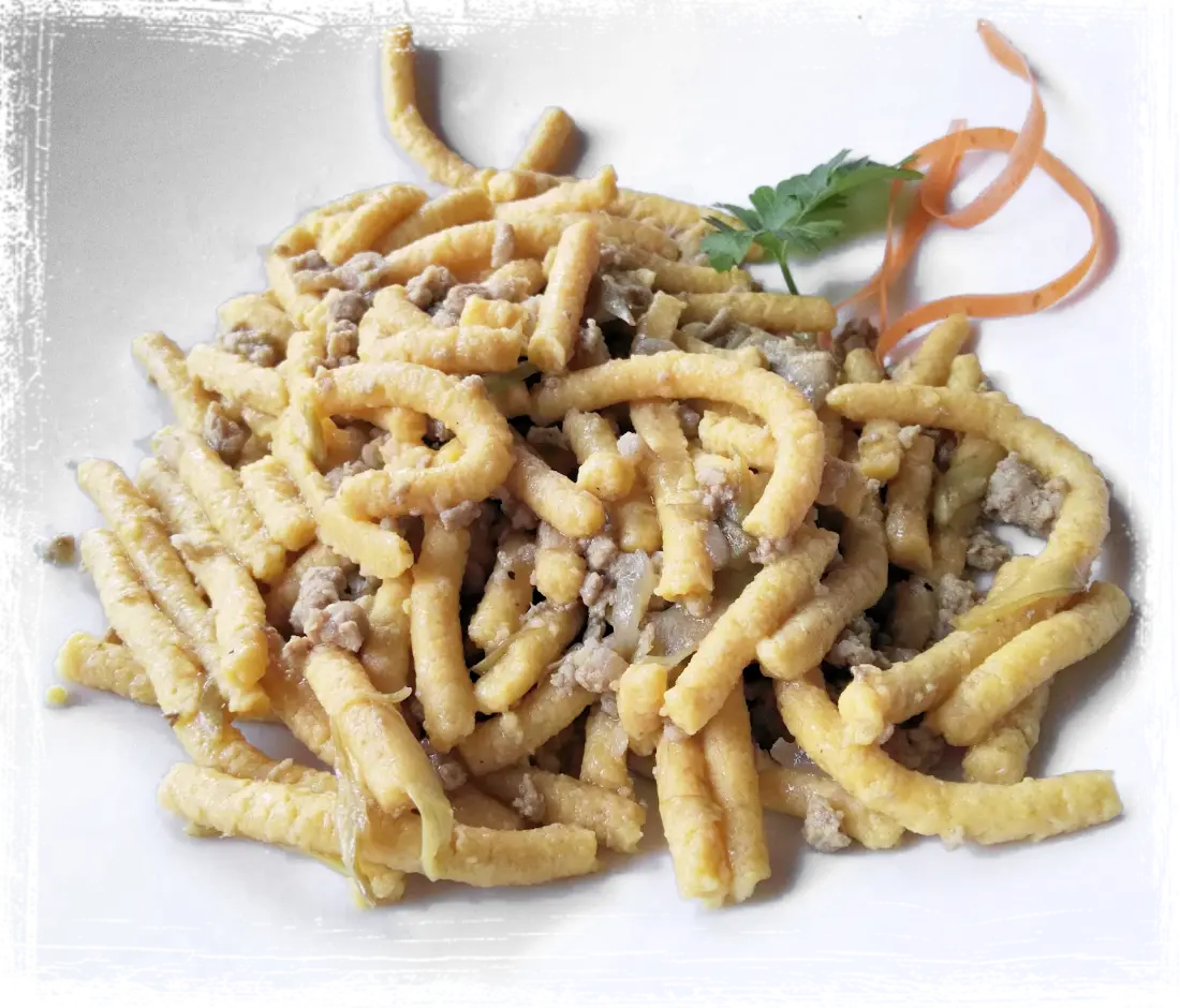 Passatelli al ragù bianco di vitello e carciofi