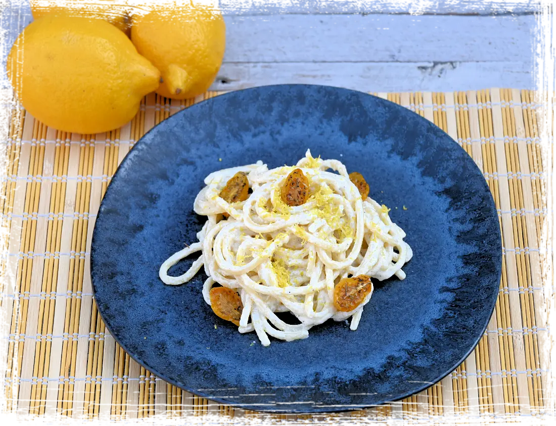 Pici con crema di ricotta al limone e pomodorini confit