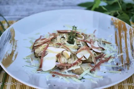 Insalata di funghi porcini crudi con straccetti di speck