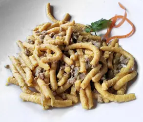 Passatelli al ragù bianco di vitello con carciofi