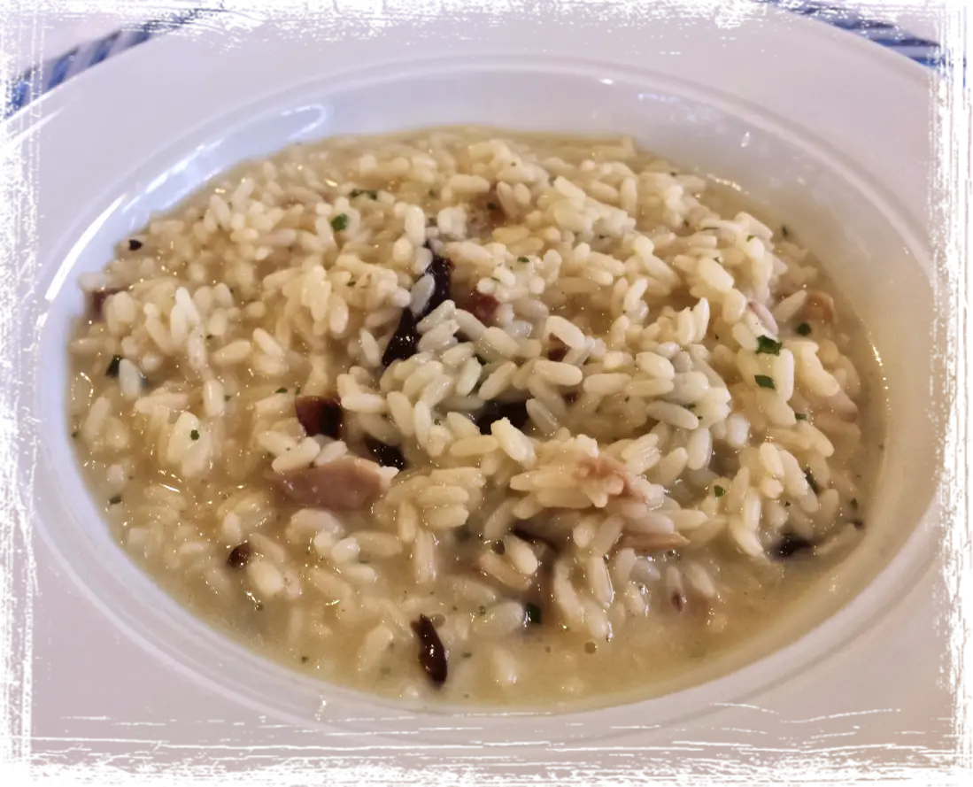 Risotto con porro e speck Risotto con porro e speck