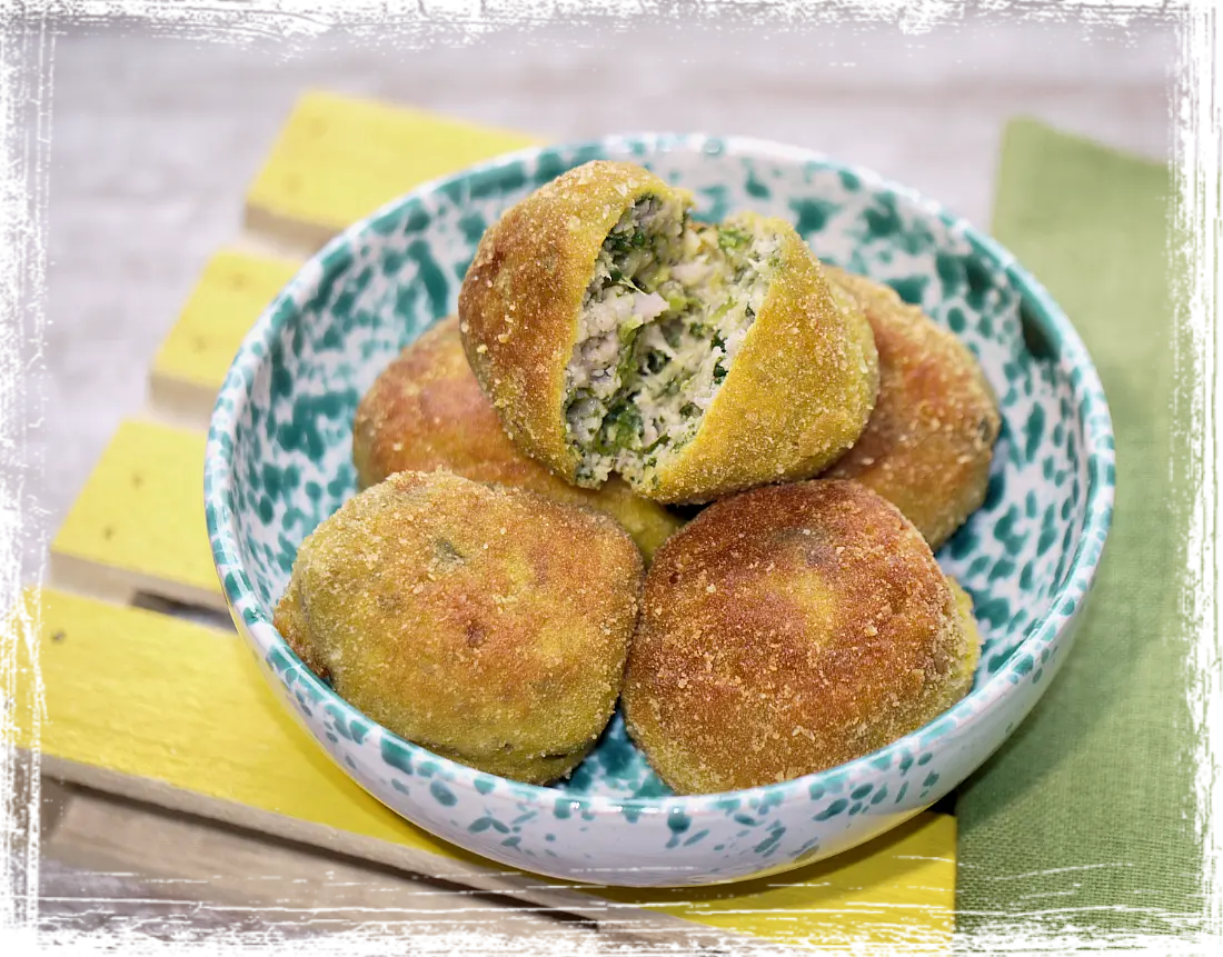 Polpette con scarola e salsiccia Polpette con scarola e salsiccia