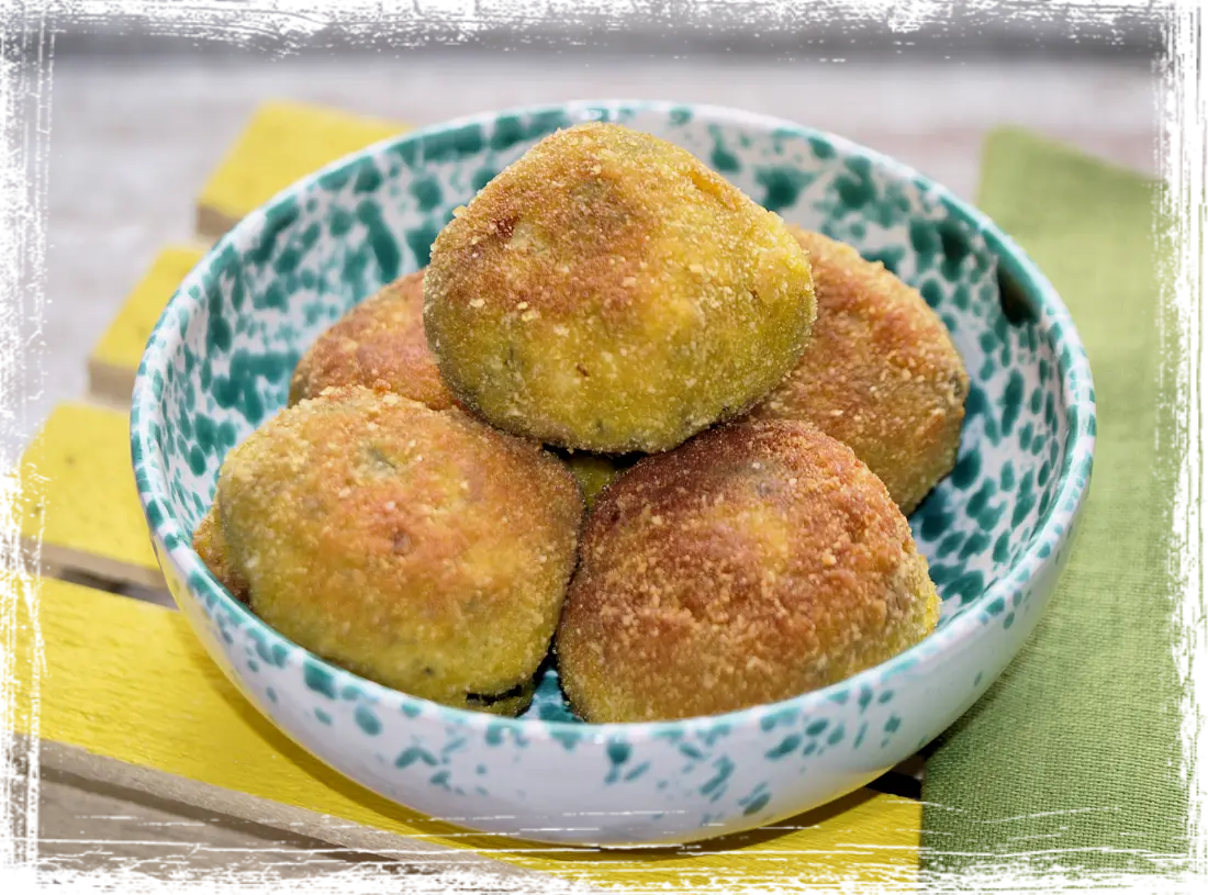 Polpette con scarola e salsiccia Polpette con scarola e salsiccia