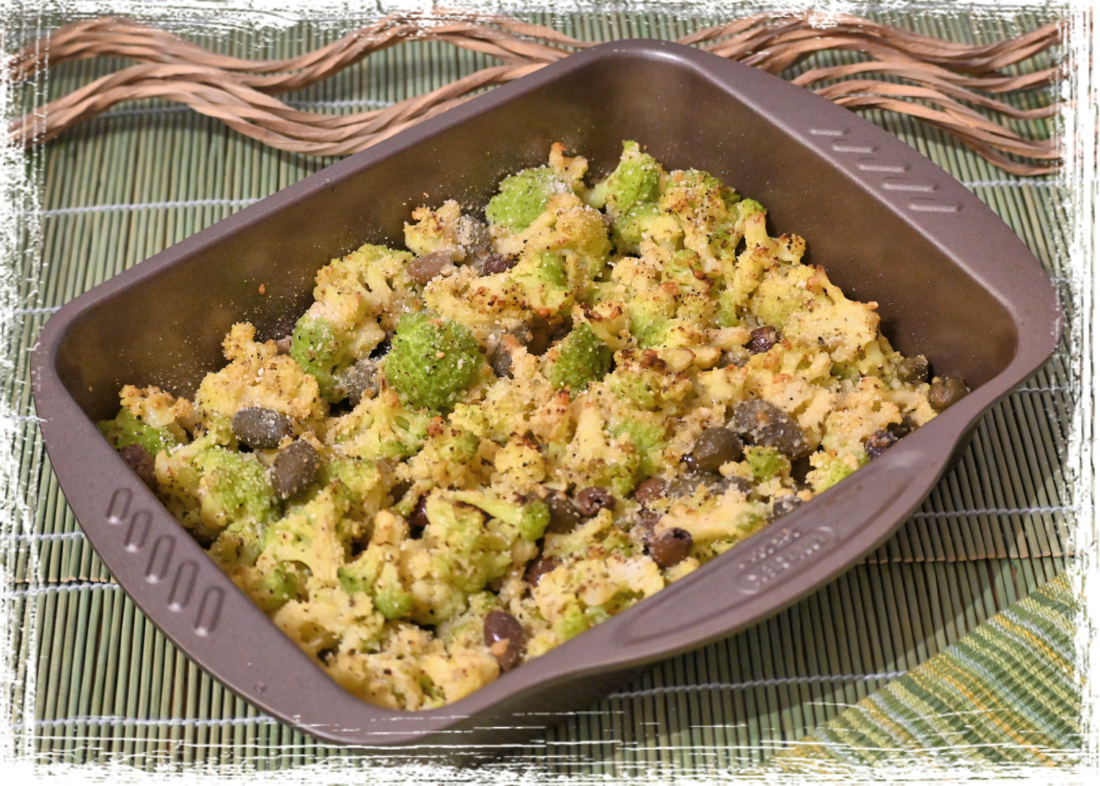 Cavolfiore gratinato al forno con olive taggiasche e frutti del cappero Cavolfiore gratinato al forno con olive taggiasche e frutti del cappero