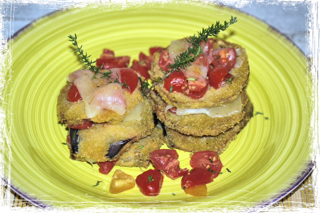 Torrette di melanzana con caciocavallo e pomodorini Torrette di melanzana con caciocavallo e pomodorini